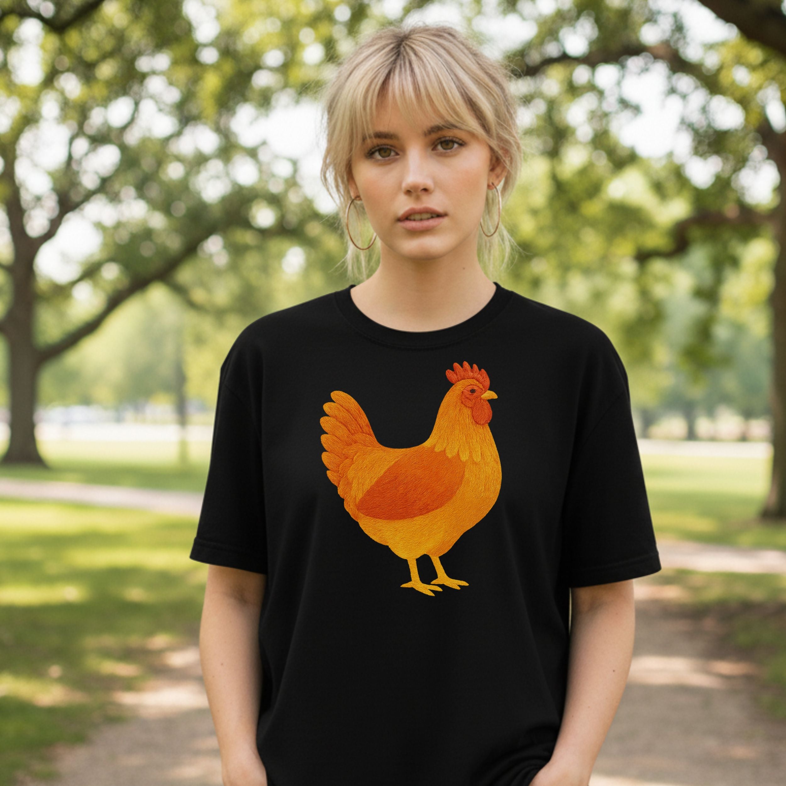 Trendy Black T-Shirt with Vibrant Orange Chicken Design