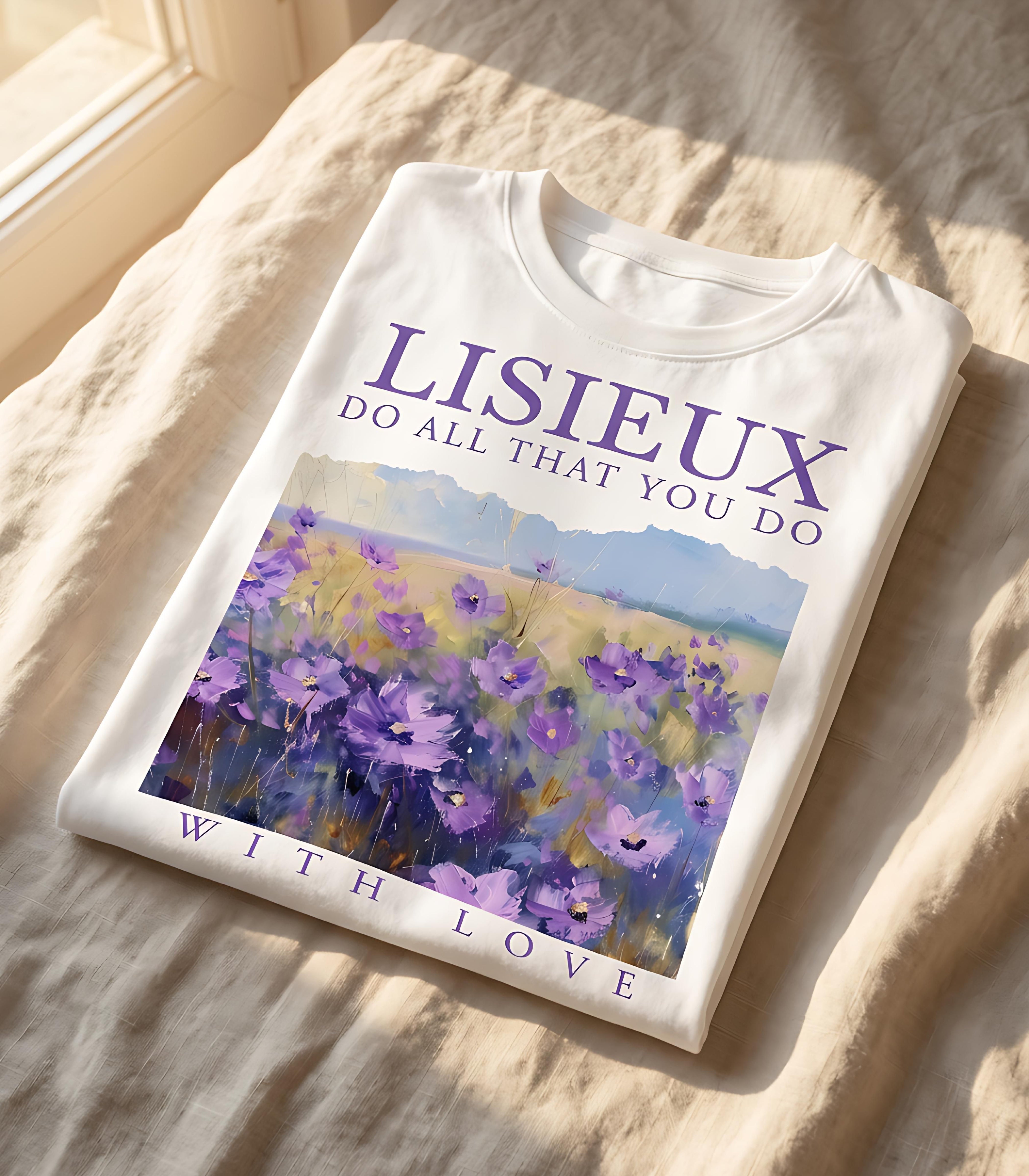 White t-shirt with "LISIEUX DO ALL THAT YOU DO WITH LOVE" and purple floral landscape.
