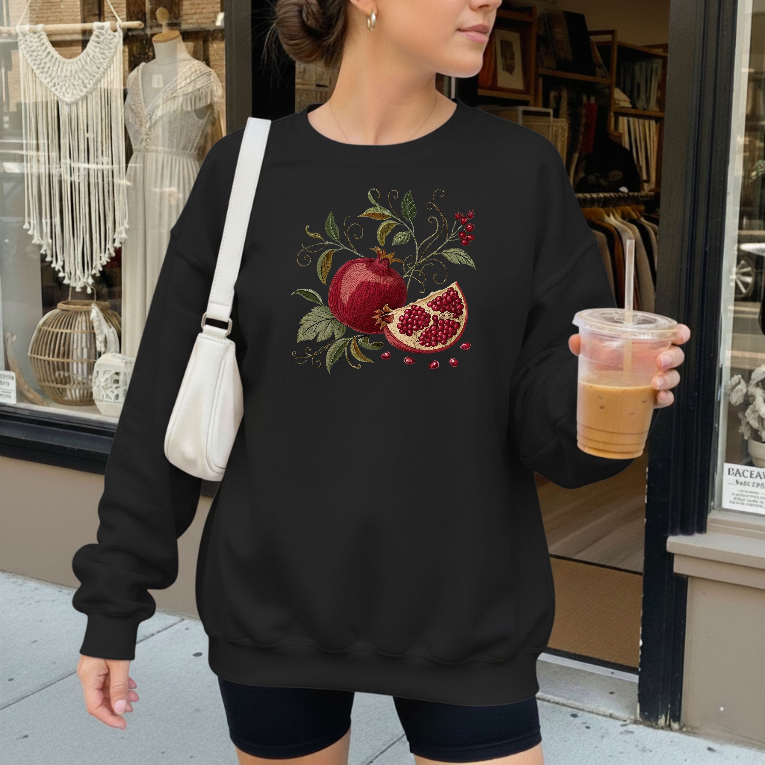 Elegant Black Sweatshirt with Pomegranate Apple Design