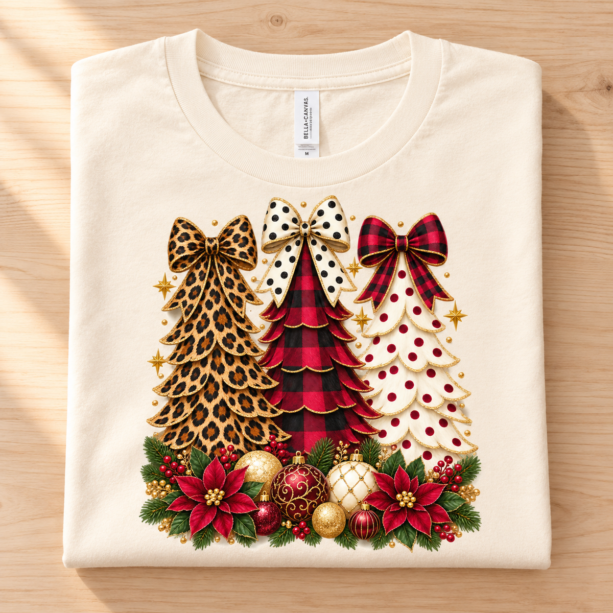 Cream t-shirt with three decorated Christmas trees and festive holiday ornaments.