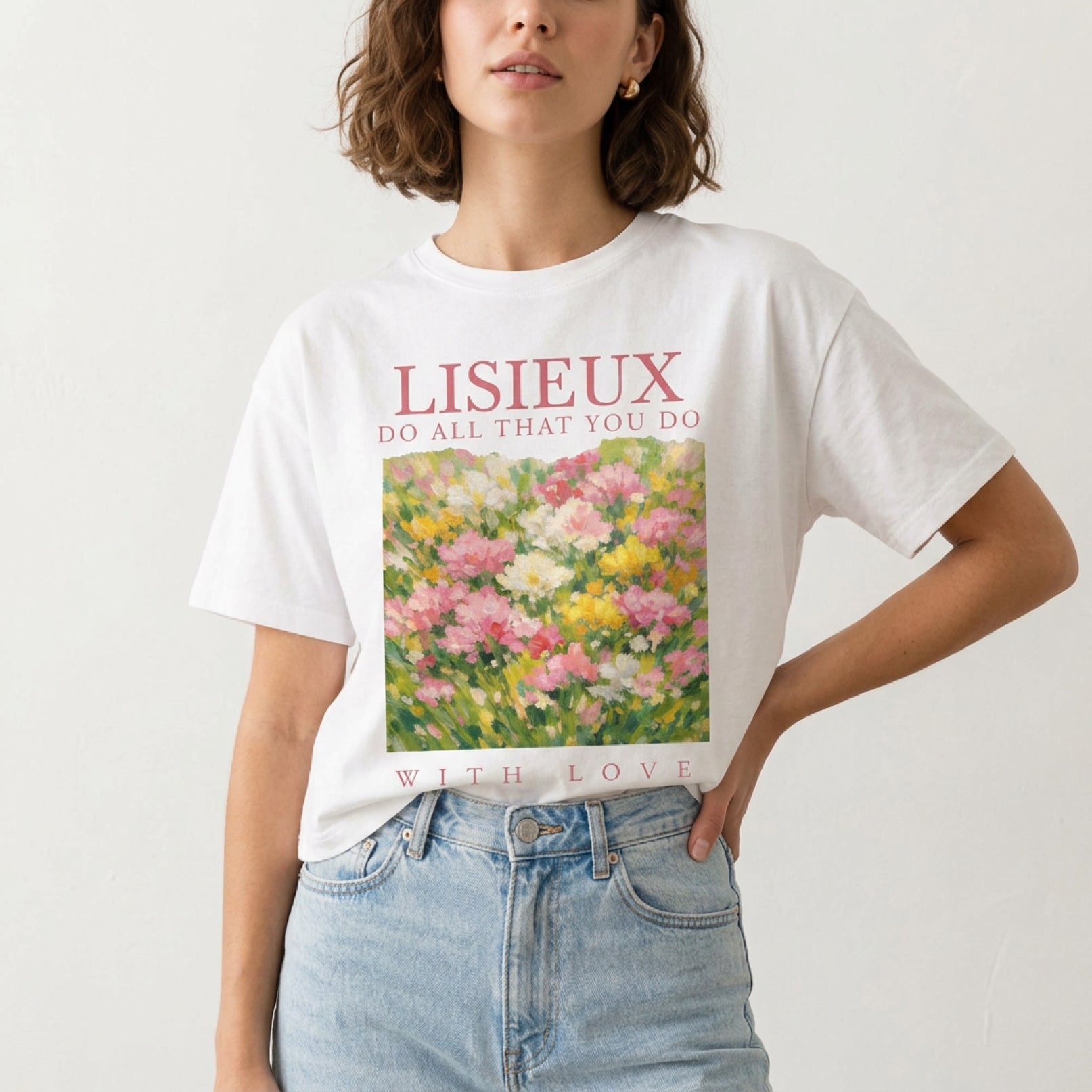 White t-shirt with "LISIEUX DO ALL THAT YOU DO WITH LOVE" and floral print.