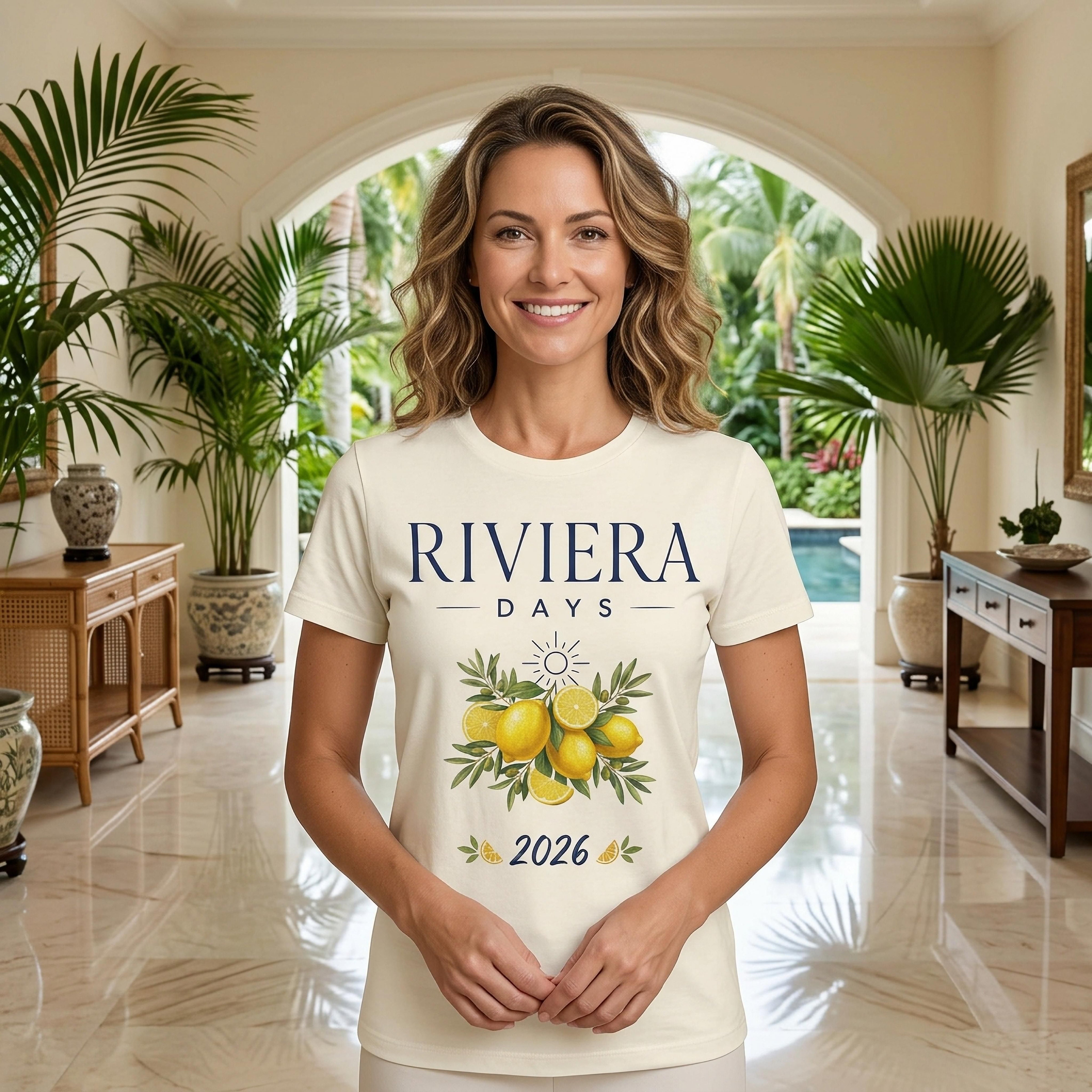 Woman wearing a cream t-shirt with "Riviera Days 2026" and lemon graphic.