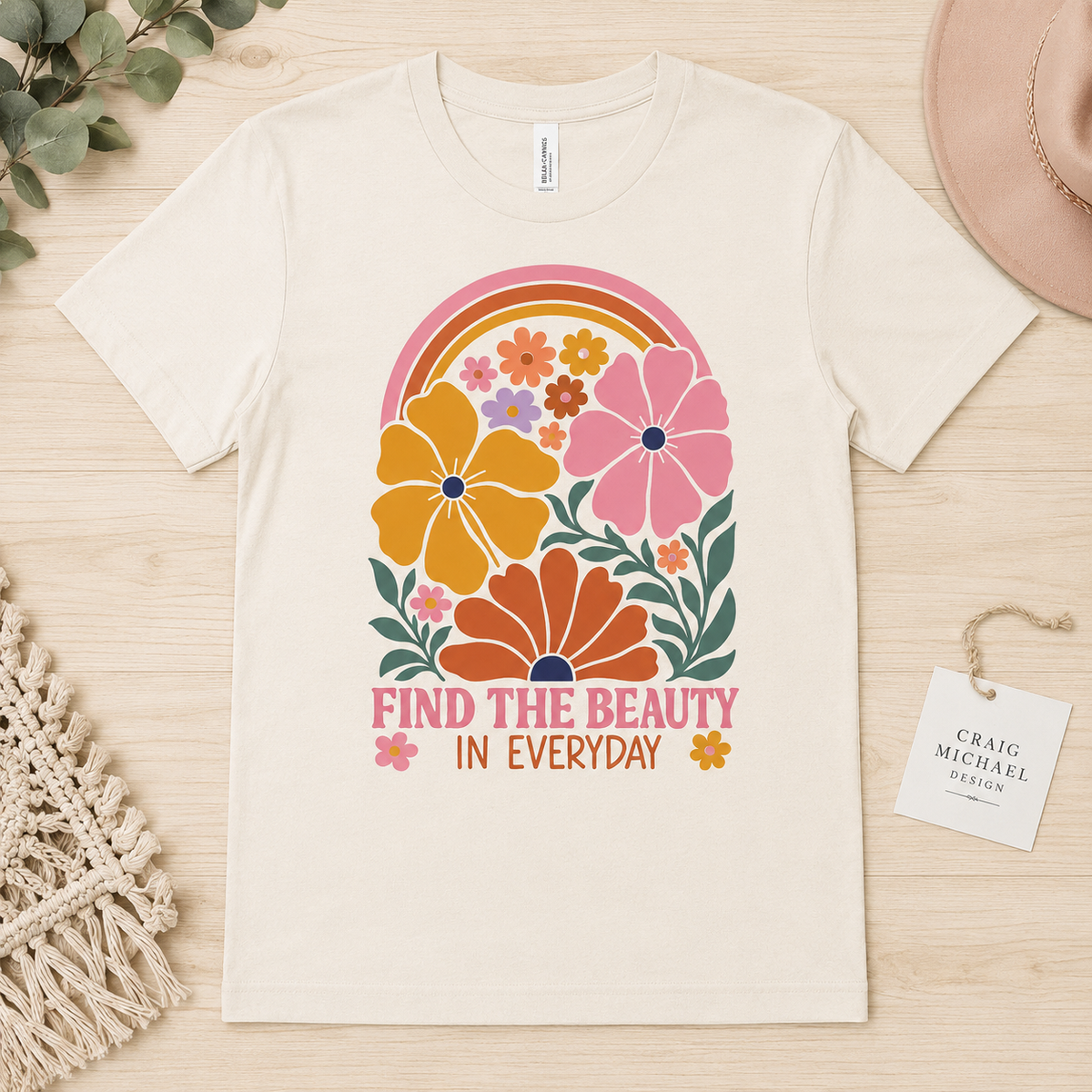 Cream t-shirt with retro floral design and text "FIND THE BEAUTY IN EVERYDAY".