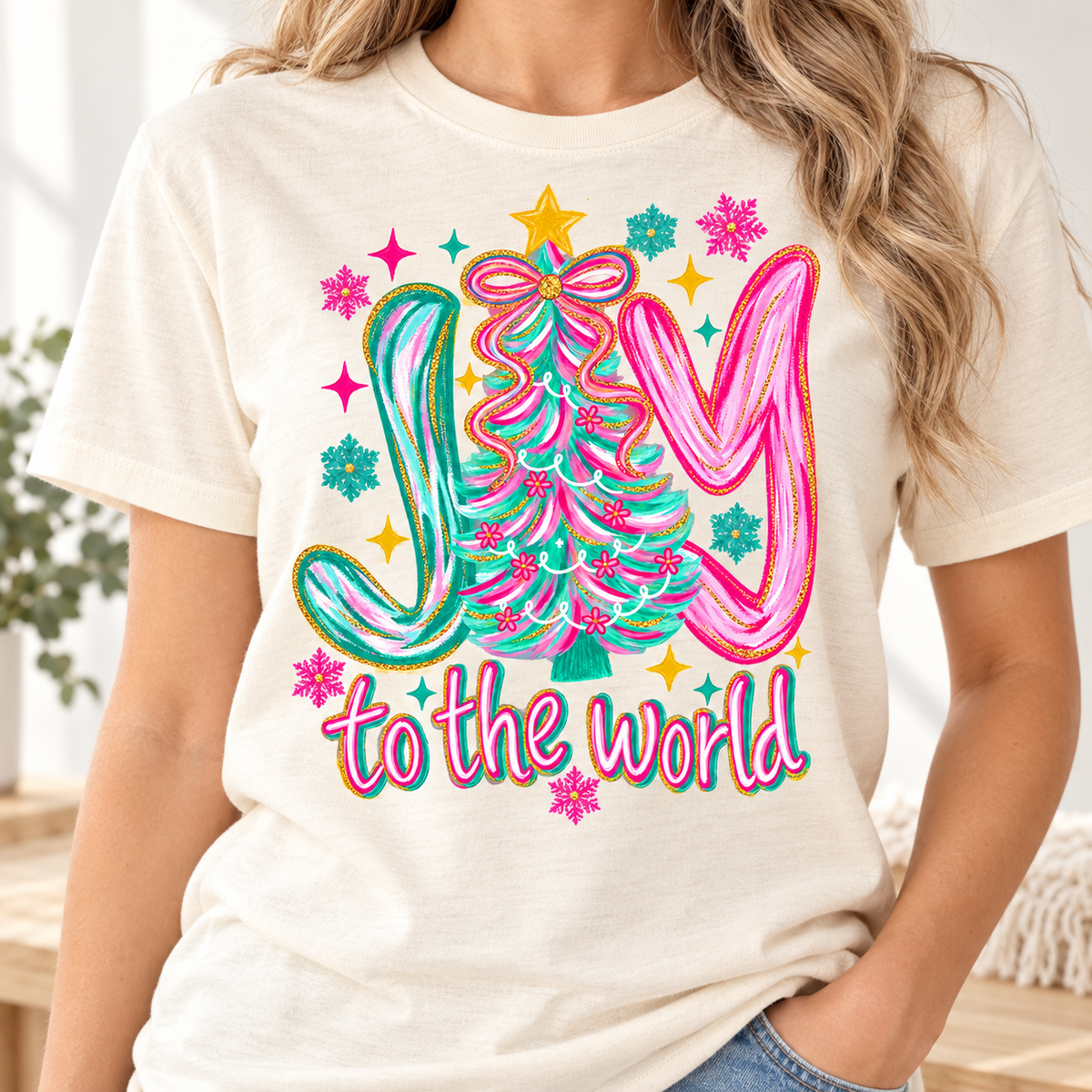Cream t-shirt with "JOY to the world" and a Christmas tree graphic.