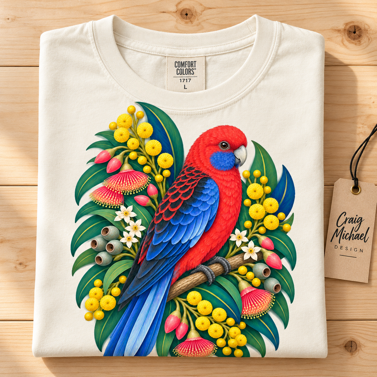 Cream t-shirt with Australian parrot and floral illustration, Comfort Colors tag.