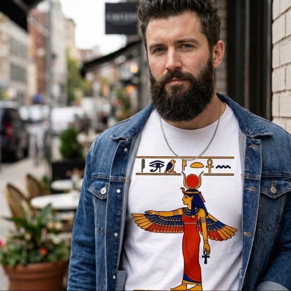 Man wearing a t-shirt with Egyptian goddess artwork and hieroglyphs.