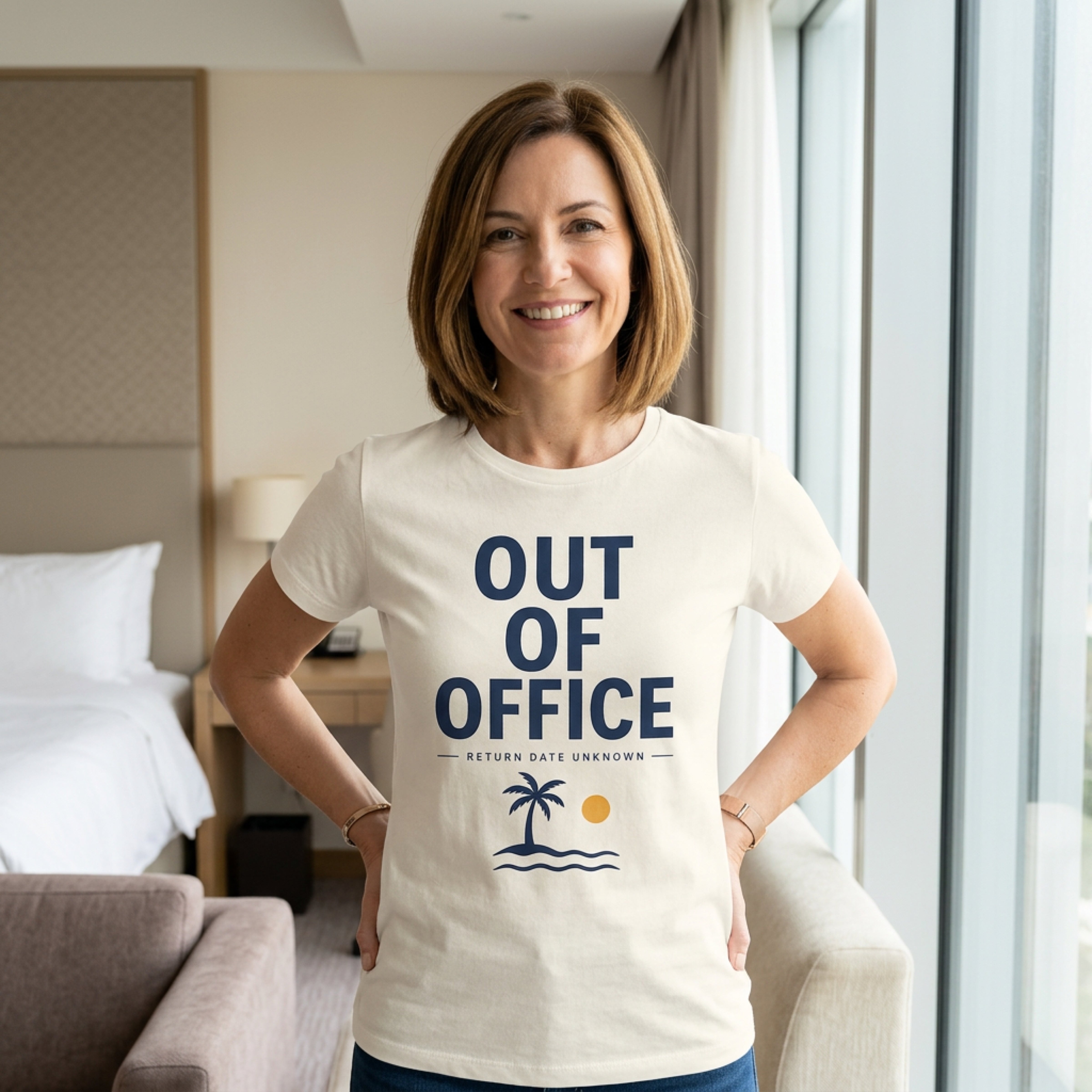Cream t-shirt with "Out Of Office" and a sunset graphic.