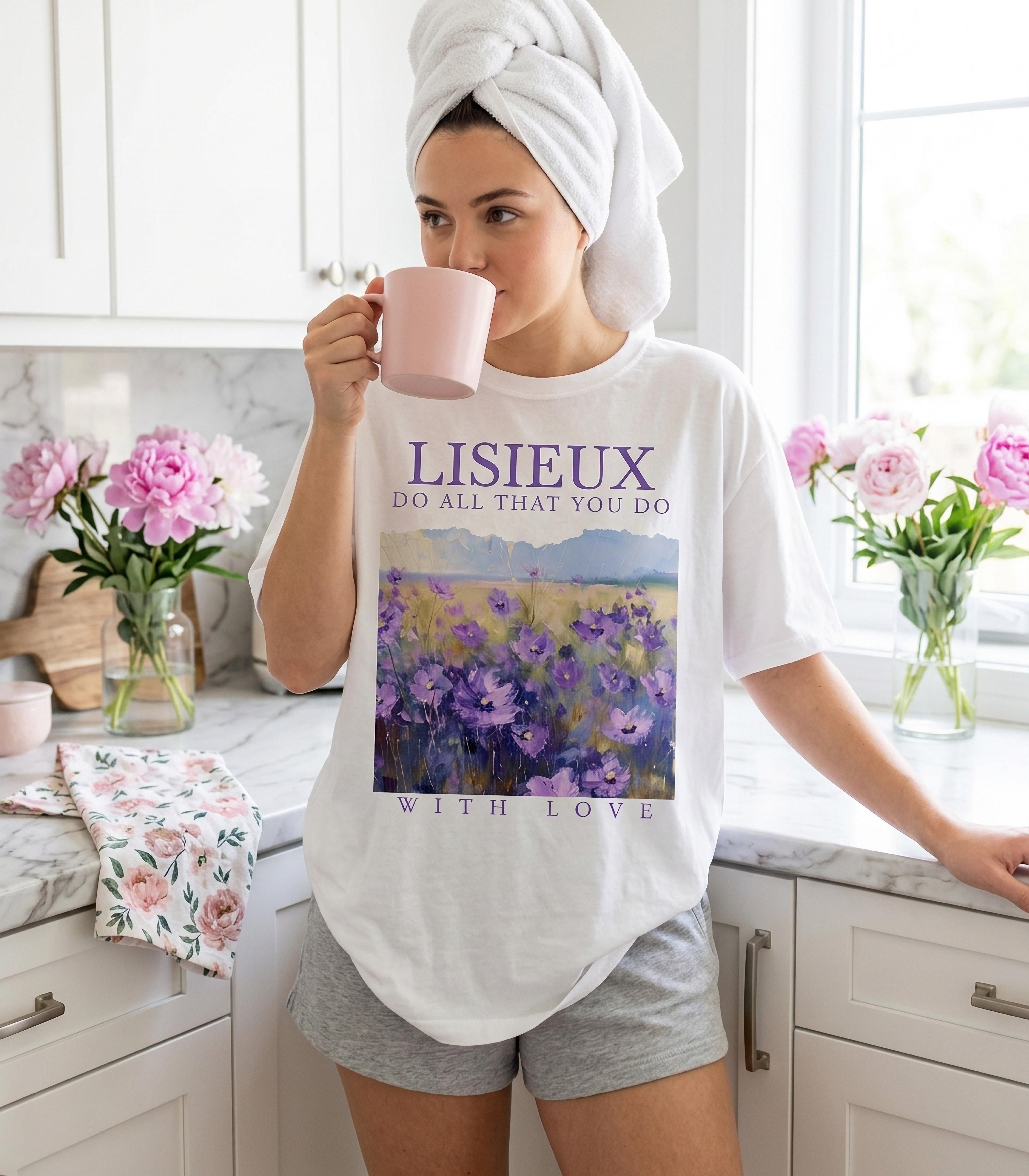 White t-shirt with "LISIEUX DO ALL THAT YOU DO WITH LOVE" and floral artwork.