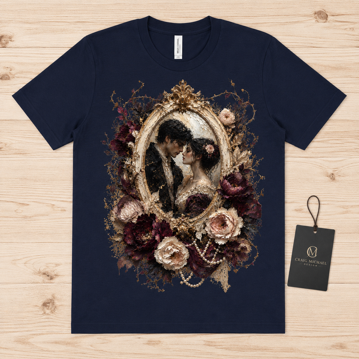 Dark navy t-shirt with an oval portrait of a couple surrounded by ornate flowers and pearls.