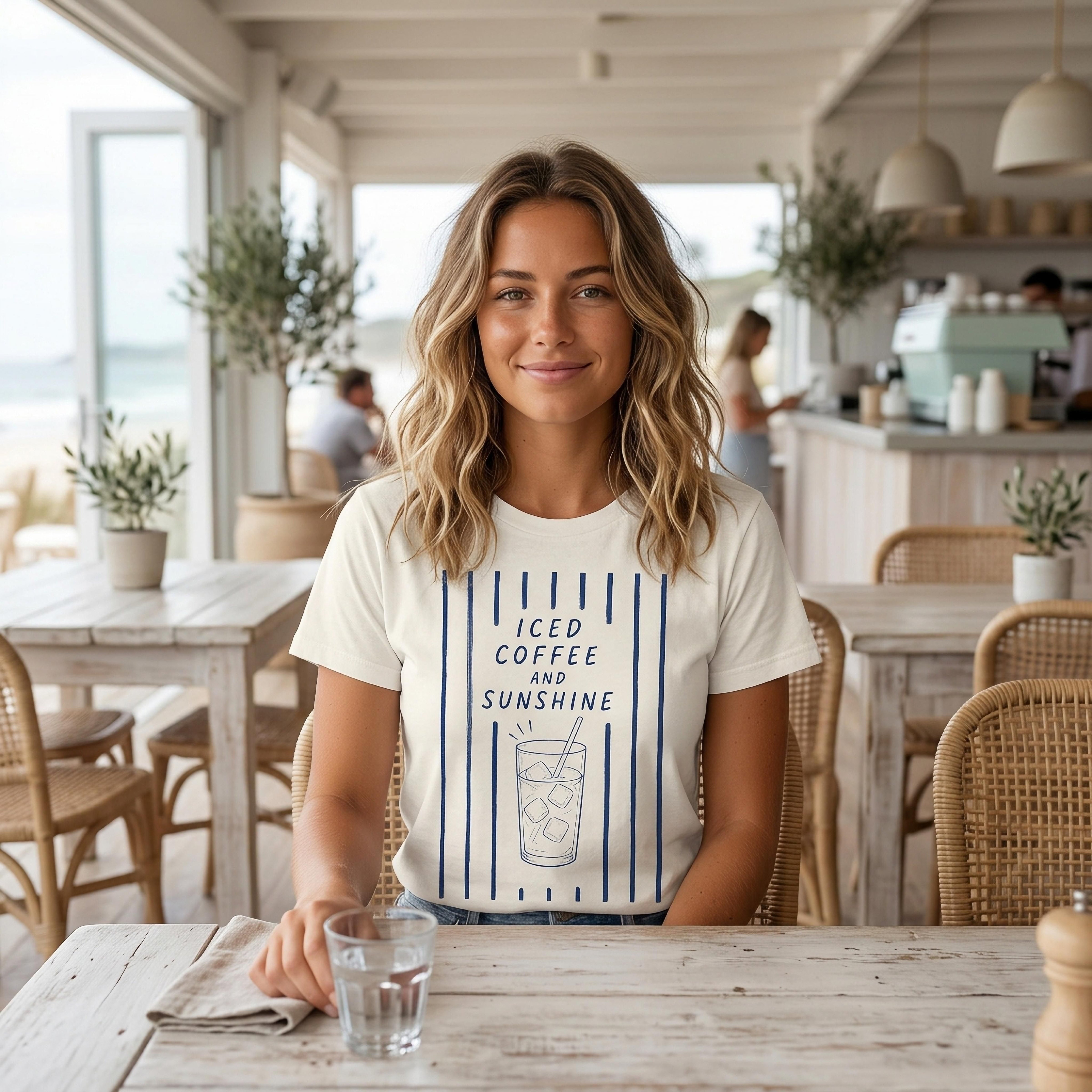 Woman wearing a white t-shirt with "ICED COFFEE AND SUNSHINE" text.