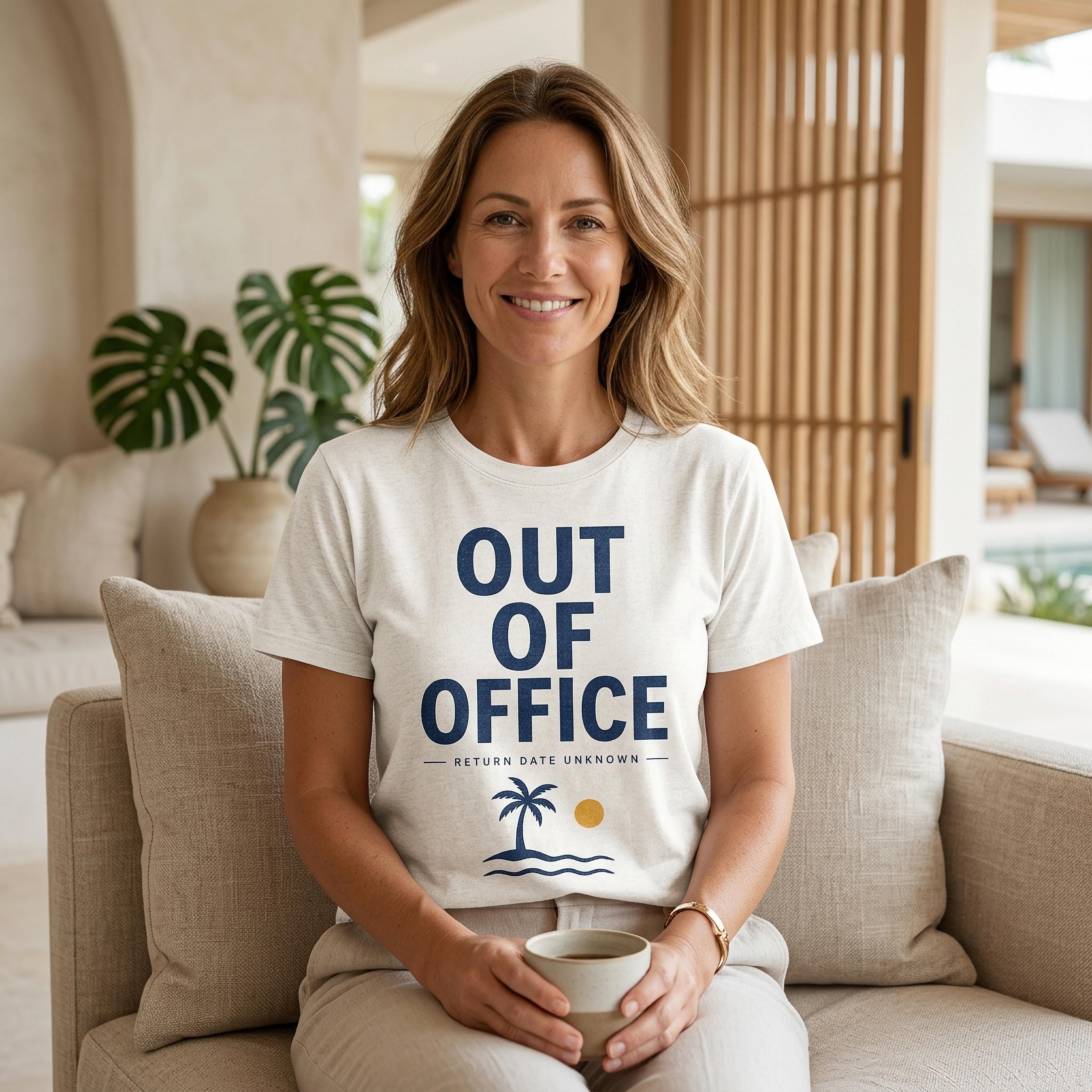 Woman wearing a t-shirt that says "OUT OF OFFICE" with a palm tree and sun.
