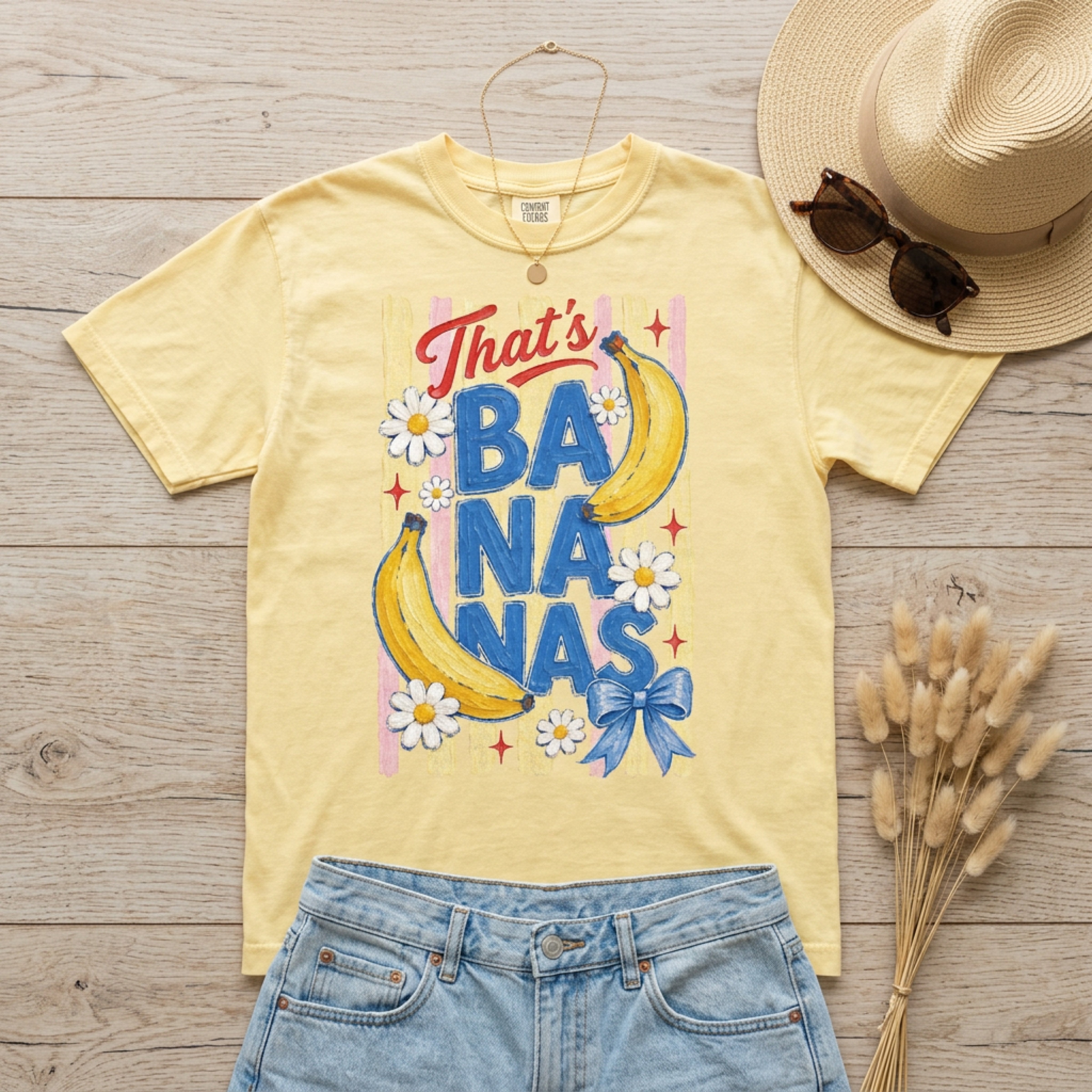 Yellow t-shirt with "That's Bananas" text and cartoon bananas.