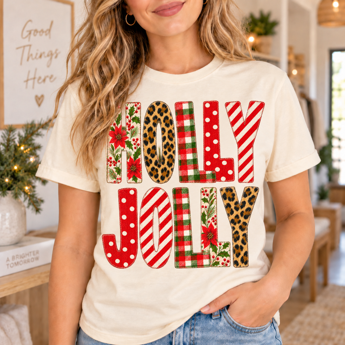 Cream t-shirt with "Holly Jolly" text in various festive patterns.