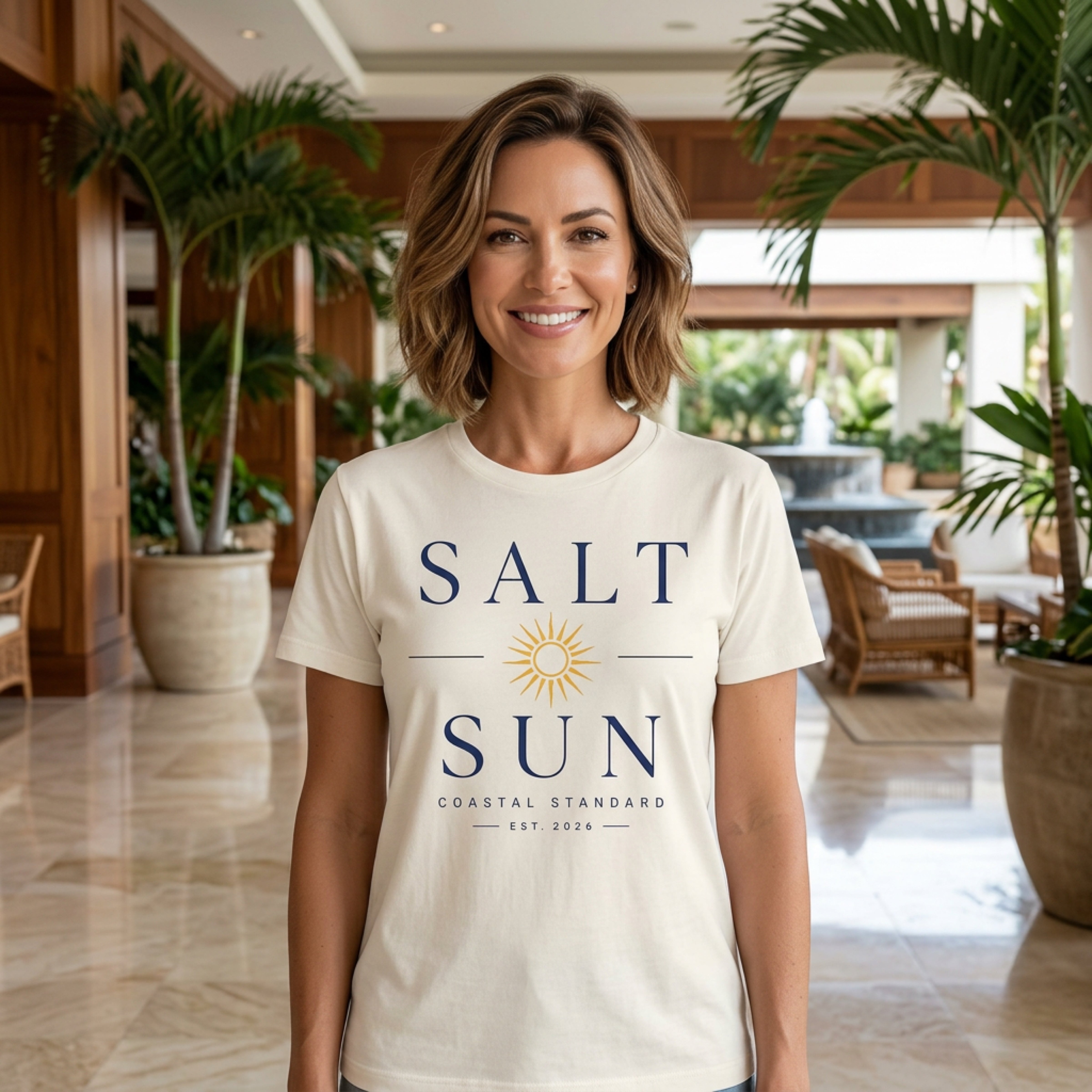 Cream t-shirt with "SALT SUN" logo and sun graphic.