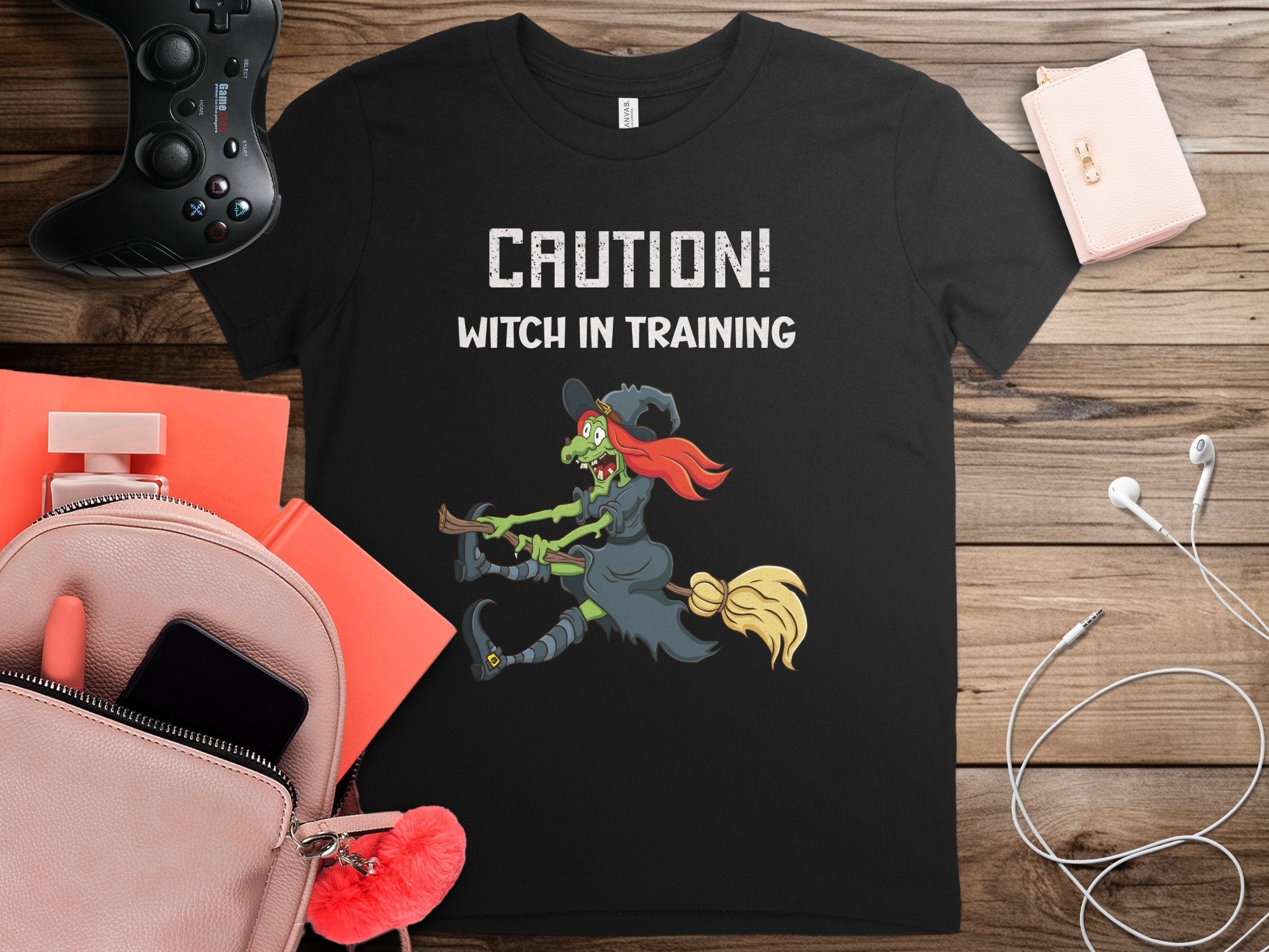 Caution Witch In Training T-Shirt Funny Halloween Witch Design Spooky Graphic Tee Perfect Halloween Costume Shirt - Craig Michael Design