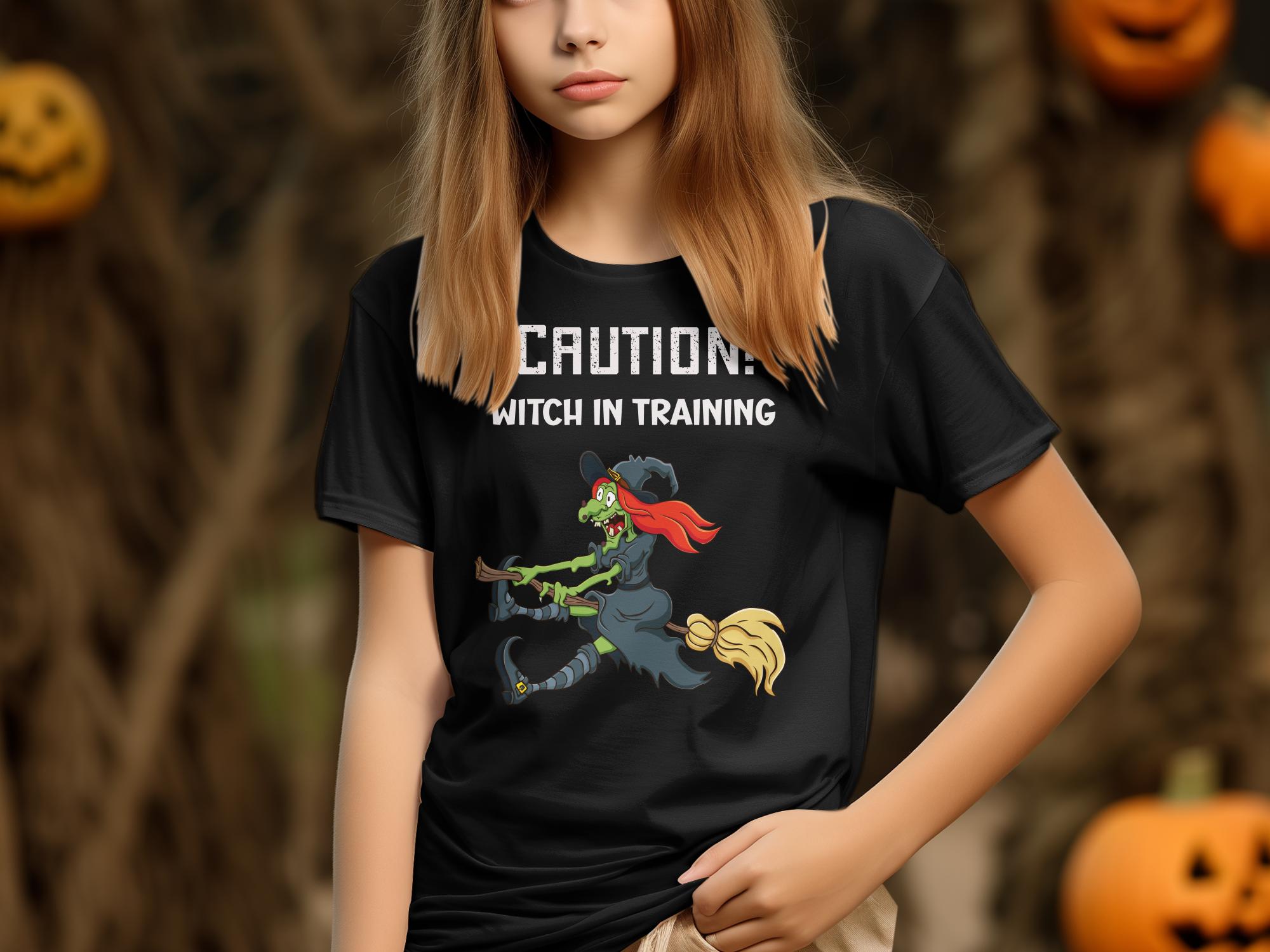 Caution Witch In Training T-Shirt Funny Halloween Witch Design Spooky Graphic Tee Perfect Halloween Costume Shirt - Craig Michael Design