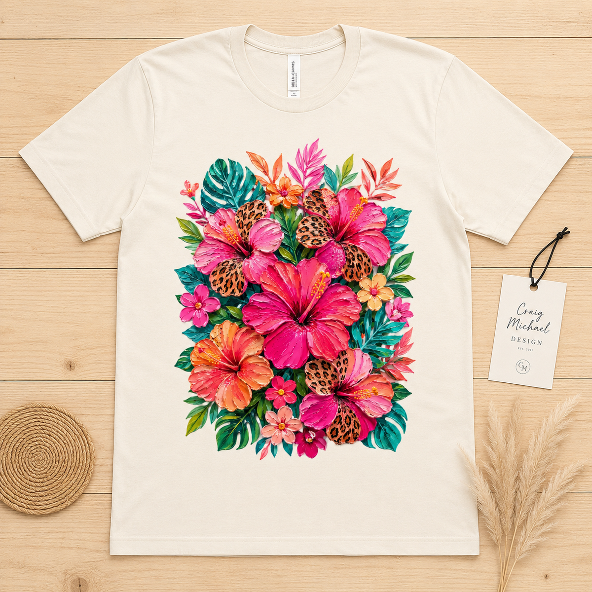 Cream t-shirt with a vibrant floral and leopard print design.