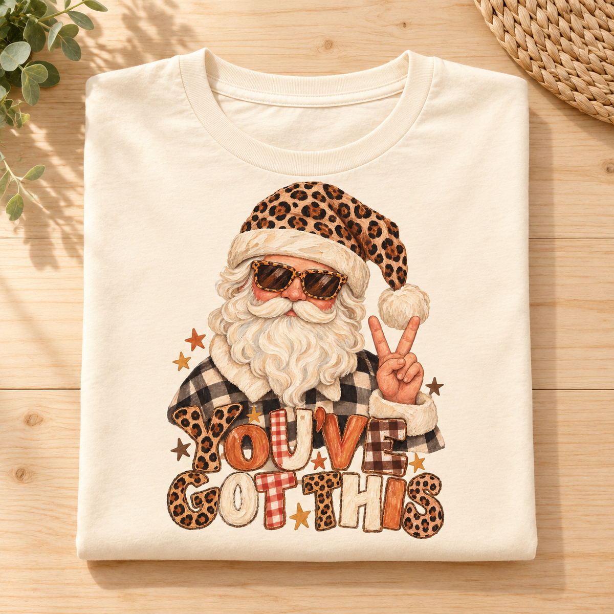 Santa Claus wearing sunglasses and a leopard print hat makes a peace sign.