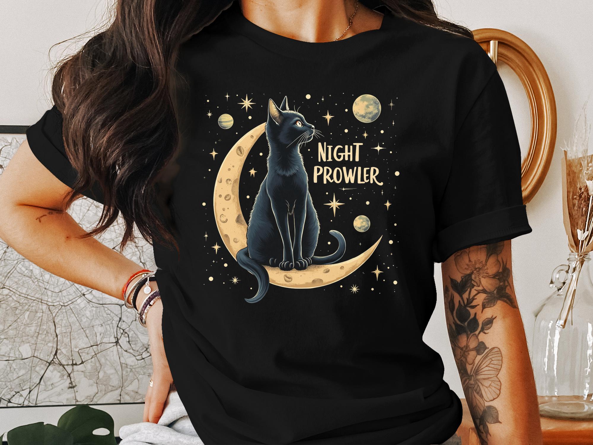 Night Prowler Cat T Shirt, Black Cat Moon Design Tee, Celestial Cats Graphic Shirt, Space Lover Cat Shirt Gift, Trendy Cat Lover Tee - Craig Michael Design