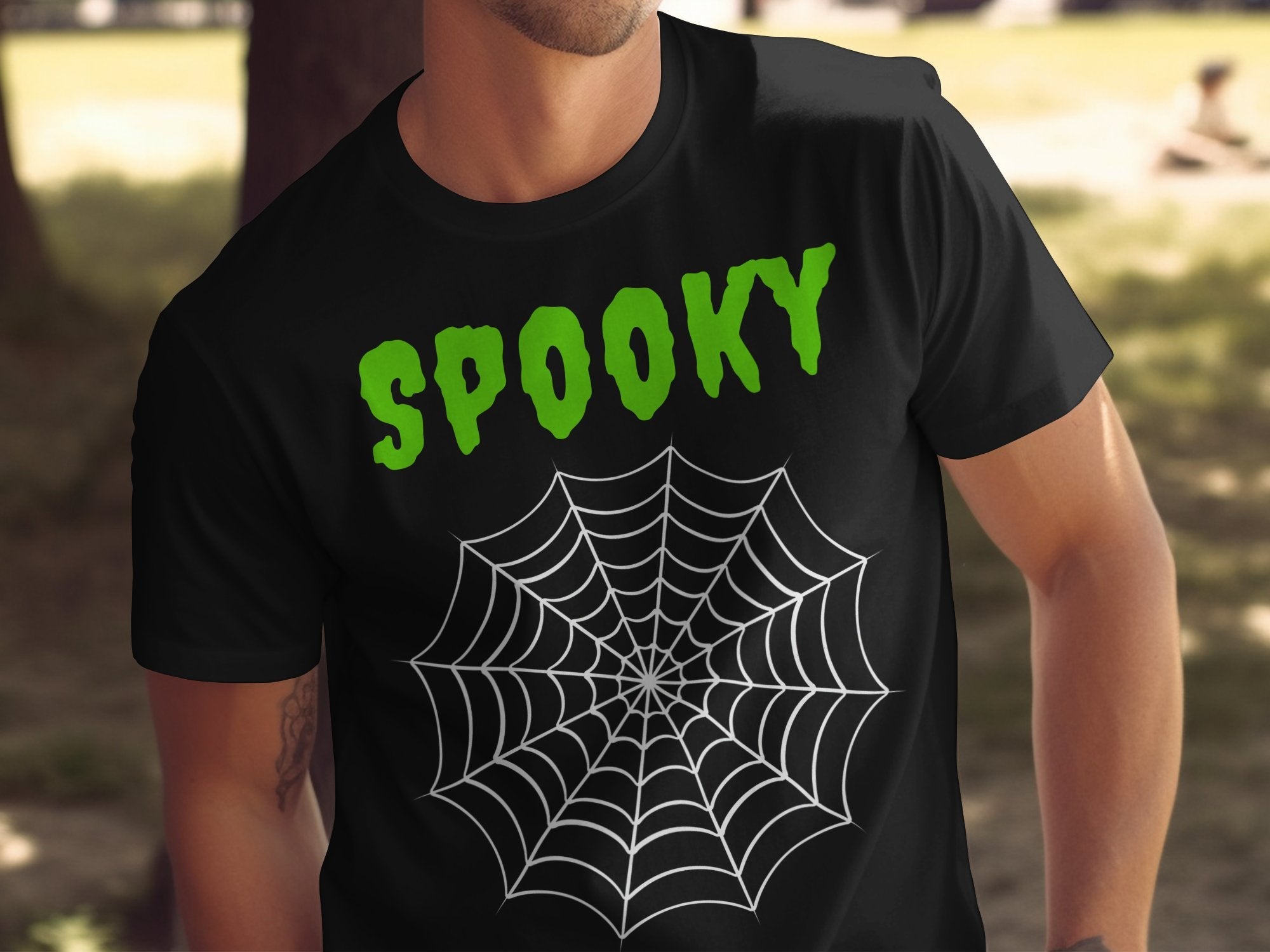 Spooky Halloween T-Shirt, Green Spooky Lettering, Custom Halloween Graphic Tee, Spider Web Design, Ghostly Halloween Apparel - Craig Michael Design