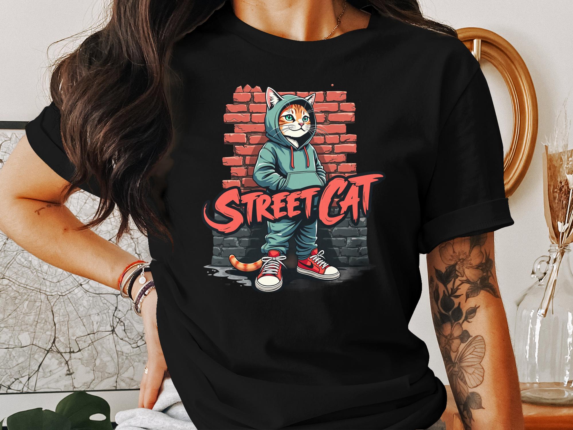 Street Cat Graphic Tee, Urban Streetwear T-Shirt, Hipster Cat in Hoodie, Cool Cat Apparel, Trendy Cat Print Tee, Casual Street Look - Craig Michael Design